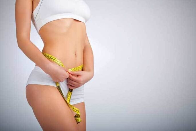 The slender girl measures the volume of life